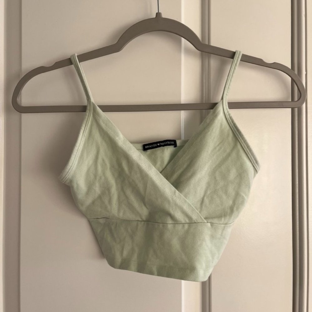 light green criss cross brandy melville top